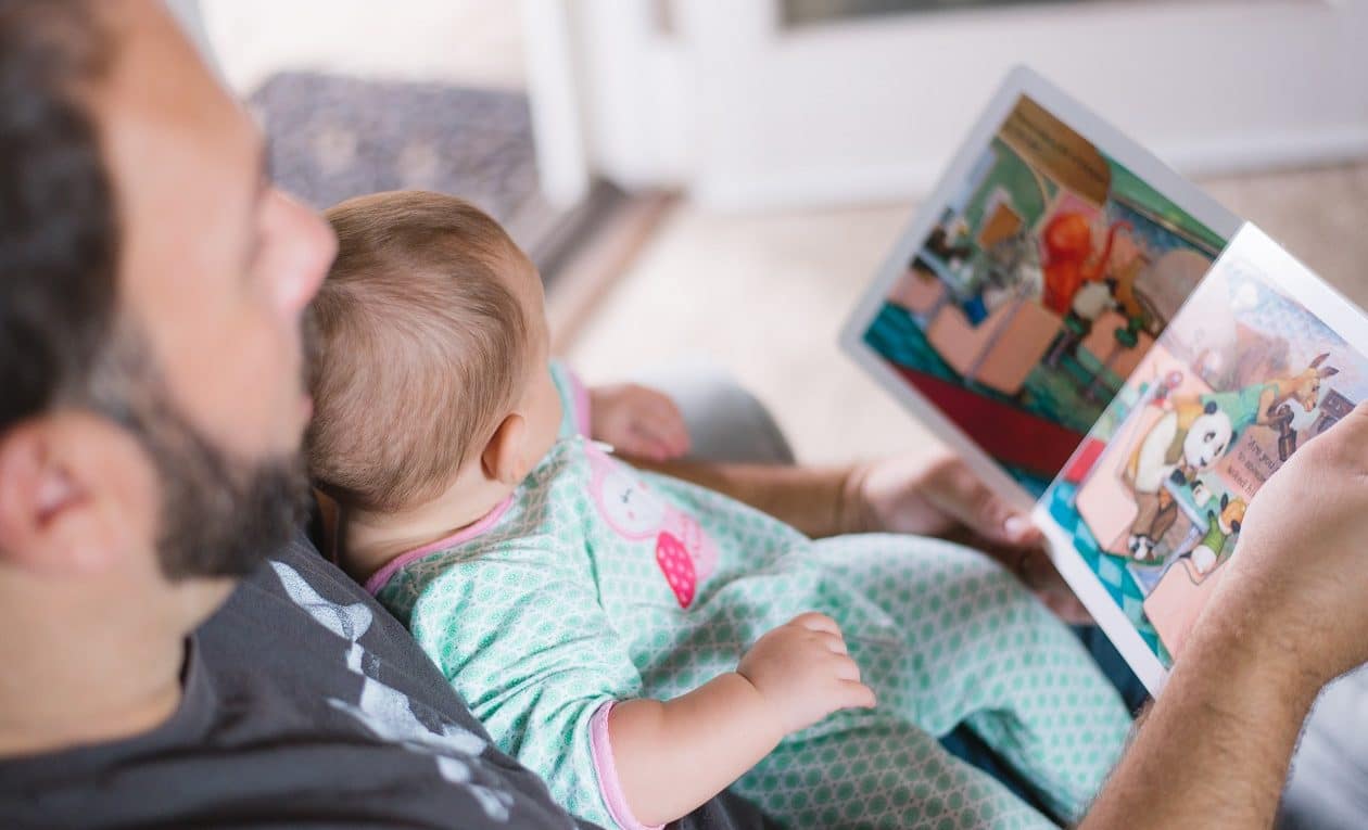 reading to infant baby
